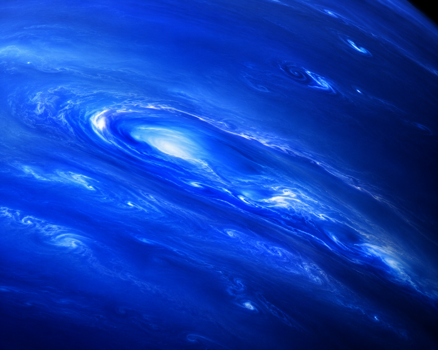 Close-up view of Neptune's bright methane cloud systems moving across its deep blue atmosphere.
