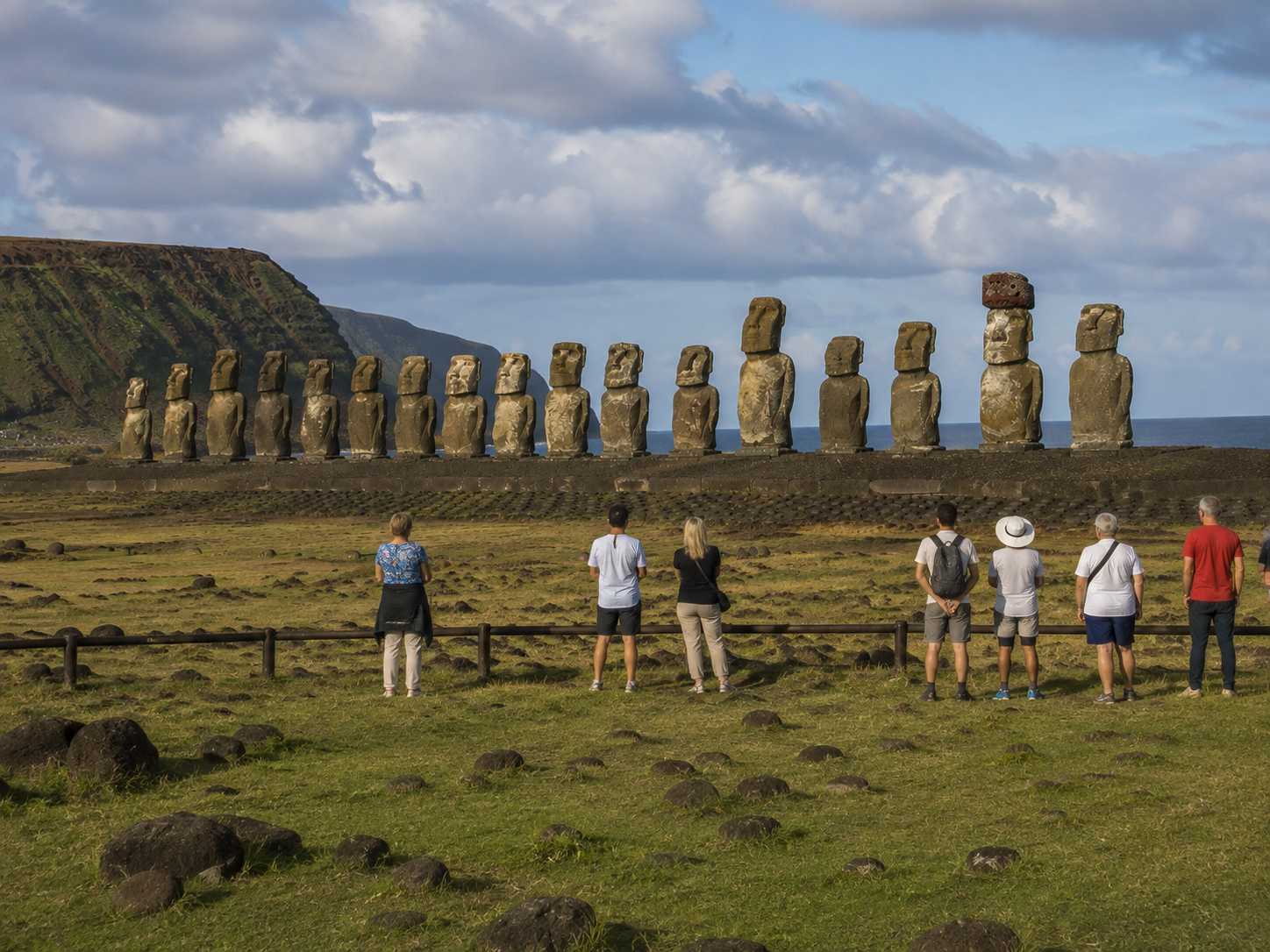 Visitors viewing the moai at Ahu Tongariki in Rapa Nui National Park.