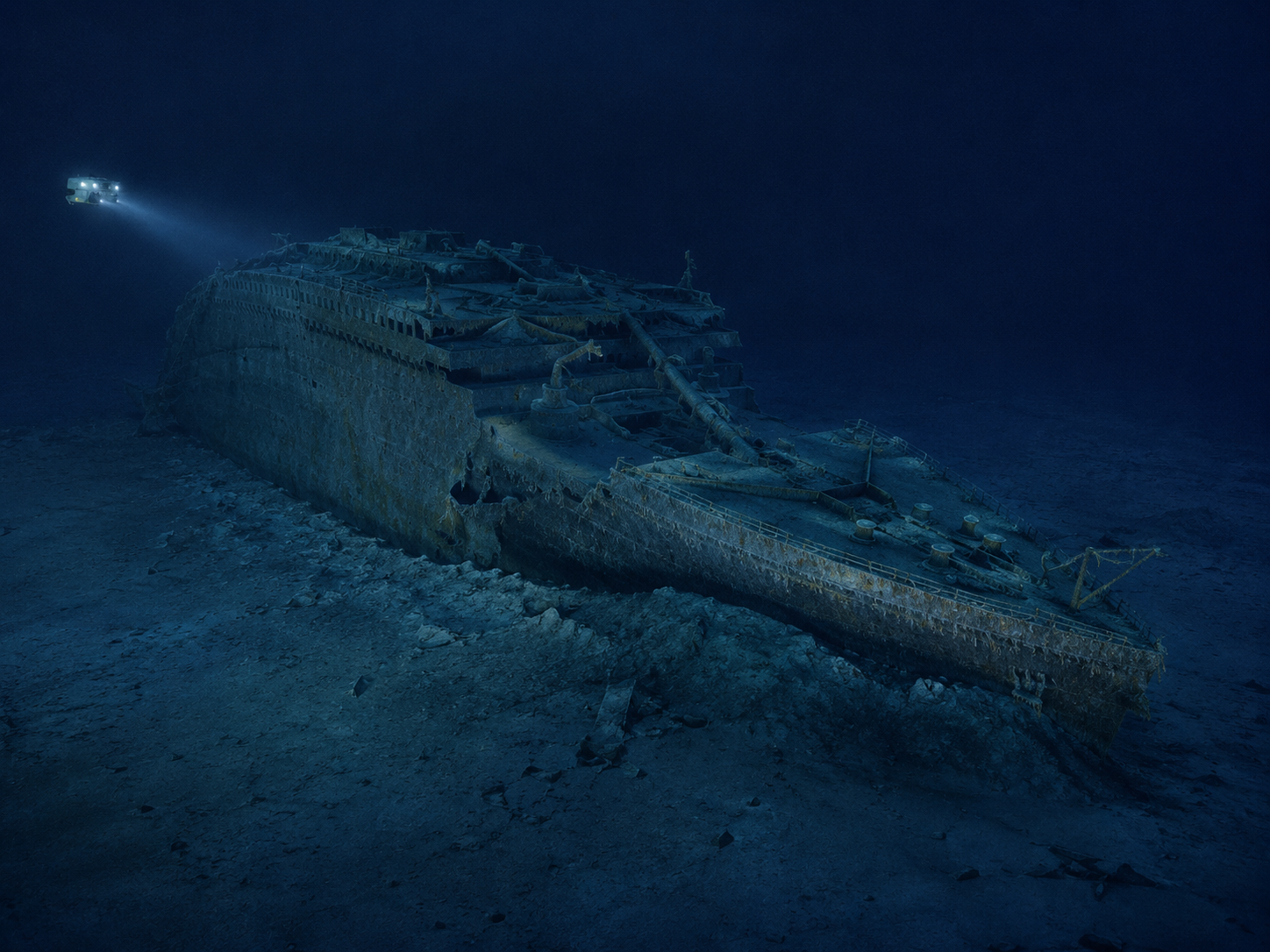 Titanic's wreck resting on the North Atlantic seabed surrounded by a debris field.