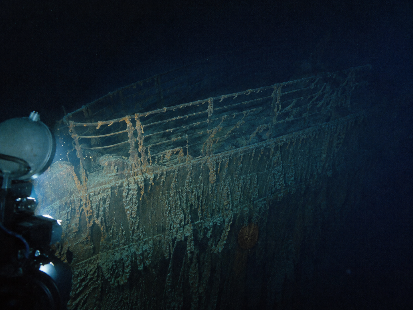 The bow of the Titanic wreck illuminated during a deep-sea archaeological expedition.