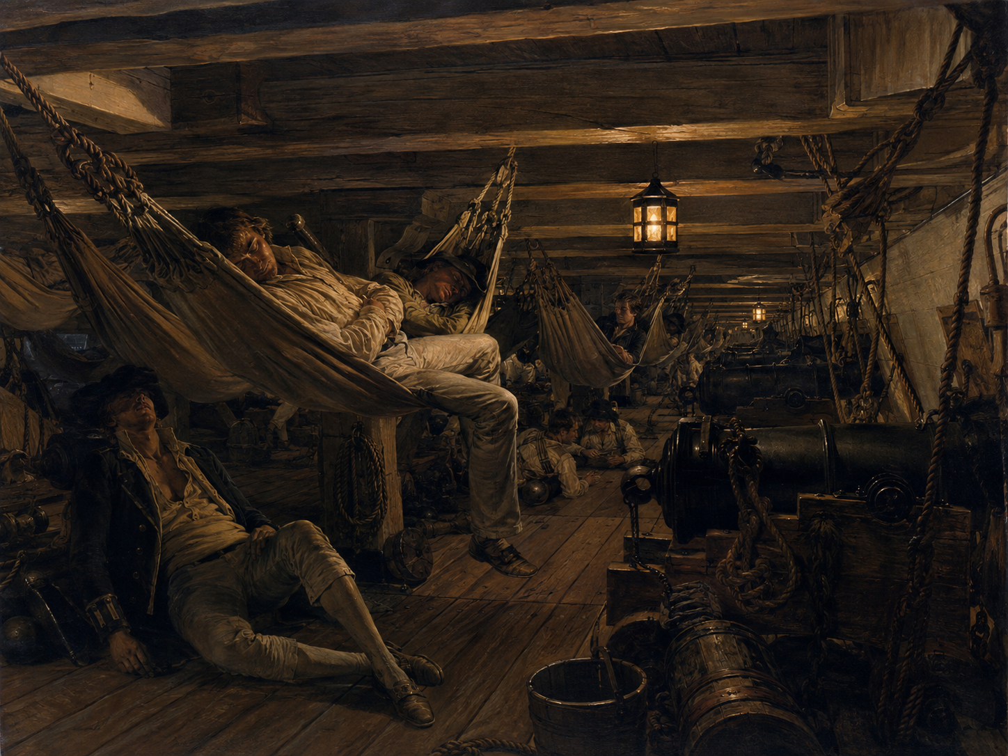 Sailors sleep in canvas hammocks above the gun deck of an 18th-century wooden warship.