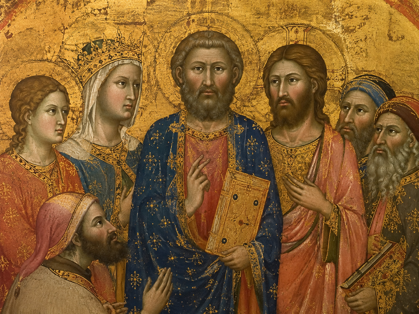 Close view of a medieval painting showing stylized faces, elongated figures and detailed clothing against a gold background.