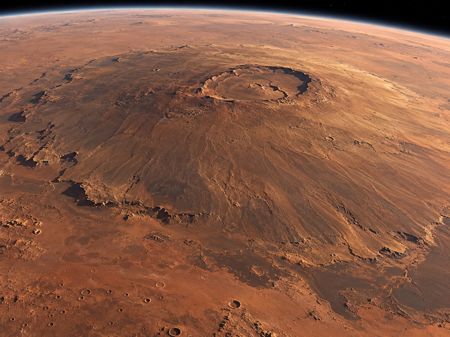 Olympus Mons rises as an enormous gently sloping shield volcano above the surrounding Martian plains.